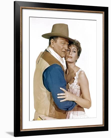 EL DORADO, 1967 directed by HOWARD HAWKS John Wayne and Charlene Holt (photo)-null-Framed Photo