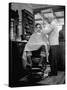 Elderly Barber Cutting Young Man's Hair-Yale Joel-Stretched Canvas