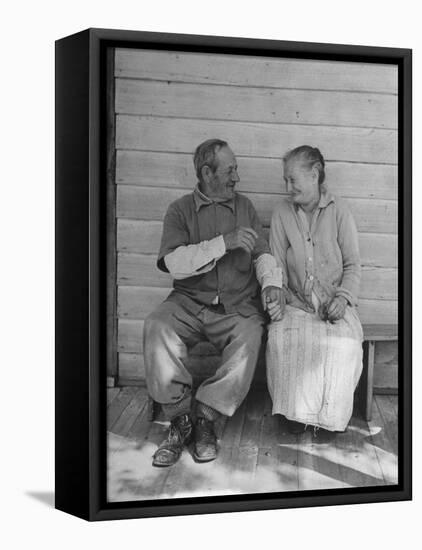 Elderly Couple Holding Hands-Peter Stackpole-Framed Stretched Canvas