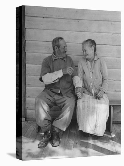 Elderly Couple Holding Hands-Peter Stackpole-Stretched Canvas