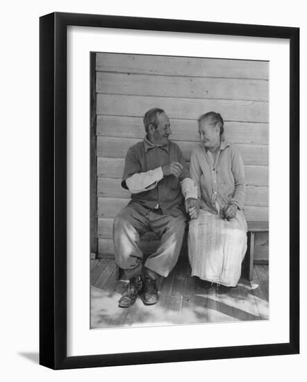 Elderly Couple Holding Hands-Peter Stackpole-Framed Photographic Print