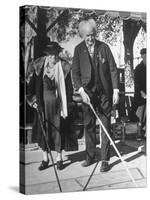 Elderly Couple Playing a Game of Shuffleboard on Outdoor Court at Hotel-Alfred Eisenstaedt-Stretched Canvas