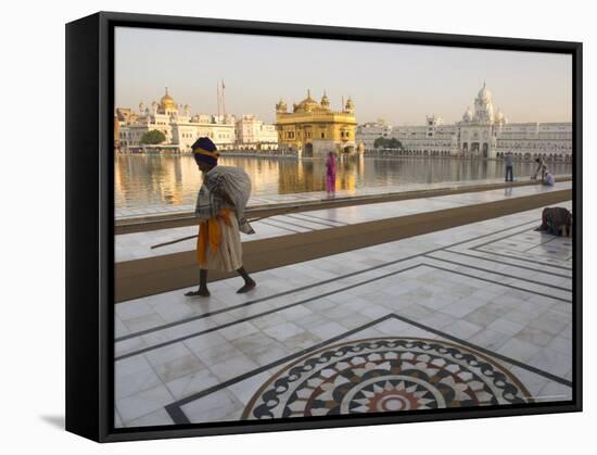 Elderly Sikh Pilgrim with Bundle and Stick Walking Around Holy Pool, Amritsar, India-Eitan Simanor-Framed Stretched Canvas