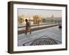 Elderly Sikh Pilgrim with Bundle and Stick Walking Around Holy Pool, Amritsar, India-Eitan Simanor-Framed Photographic Print