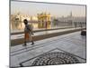 Elderly Sikh Pilgrim with Bundle and Stick Walking Around Holy Pool, Amritsar, India-Eitan Simanor-Mounted Photographic Print