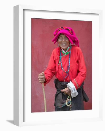 Elderly Tibetan Woman with Red Wall, Tagong, Sichuan, China-Keren Su-Framed Photographic Print