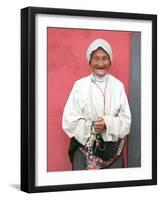 Elderly Tibetan Woman with Red Wall, Tagong, Sichuan, China-Keren Su-Framed Photographic Print