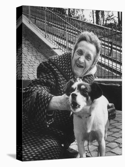 Elderly Woman with Pet Dog "Miquette" on Steps of Montmartre-Alfred Eisenstaedt-Stretched Canvas