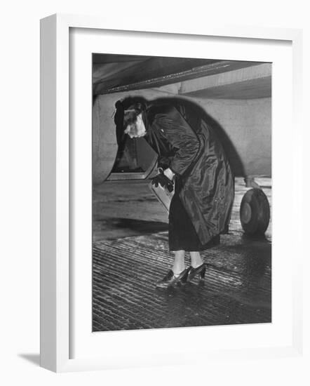 Eleanor Roosevelt Examining Rear Turret-Gunner's Compartment under the Tail Assembly of US Bomber-null-Framed Photographic Print