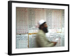 Electoral Worker Passes Election Results Posted on Wall at a Counting Center in Kabul, Afghanistan-null-Framed Photographic Print