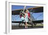 Elegant 1940's Style Pin-Up Girl Standing in Front of an F3F Biplane-null-Framed Premium Photographic Print