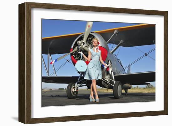 Elegant 1940's Style Pin-Up Girl Standing in Front of an F3F Biplane-null-Framed Photographic Print