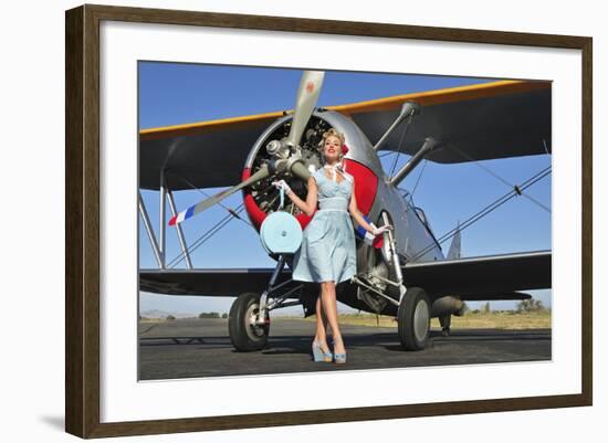 Elegant 1940's Style Pin-Up Girl Standing in Front of an F3F Biplane-null-Framed Photographic Print