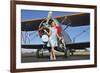 Elegant 1940's Style Pin-Up Girl Standing in Front of an F3F Biplane-null-Framed Photographic Print