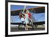 Elegant 1940's Style Pin-Up Girl Standing in Front of an F3F Biplane-null-Framed Photographic Print