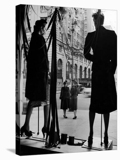 Elegantly dressed Women on Corner of Fifth Avenue and 58th in front of Window of Bergdorf Goodman-Alfred Eisenstaedt-Stretched Canvas