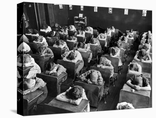 Elementary School Children with Heads Down on Desk During Rest Period in Classroom-Alfred Eisenstaedt-Stretched Canvas