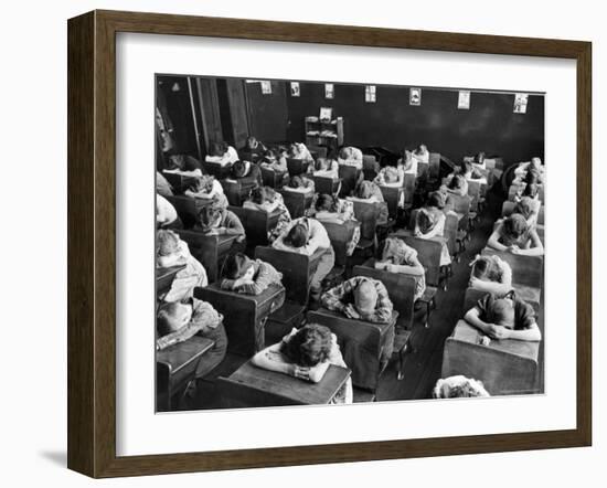 Elementary School Children with Heads Down on Desk During Rest Period in Classroom-Alfred Eisenstaedt-Framed Photographic Print