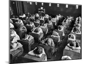 Elementary School Children with Heads Down on Desk During Rest Period in Classroom-Alfred Eisenstaedt-Mounted Photographic Print