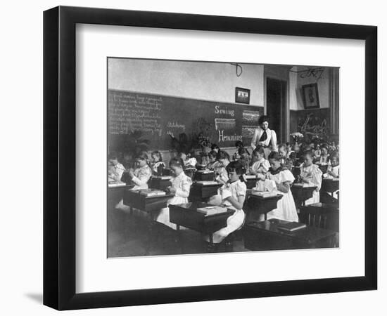 Elementary School Girls Learning Sewing-null-Framed Photographic Print