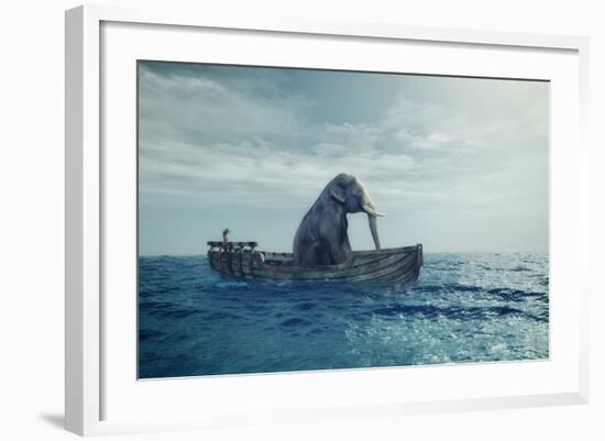 Elephant in a boat at sea.-Orlando Rosu-Framed Art Print