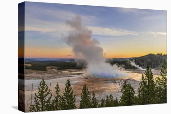 Elevated sunrise view of Grand Prismatic spring and colorful bacterial mat, Yellowstone NP, WY-Adam Jones-Stretched Canvas