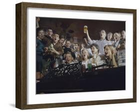 Elevated View of a Group of People as They Sing Along with a Pianist in a Unidentified Bar, 1959-Yale Joel-Framed Photographic Print