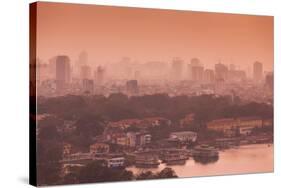 Elevated view of a lake and a city at sunset, West Lake, Tay Ho, Hanoi, Vietnam-null-Stretched Canvas