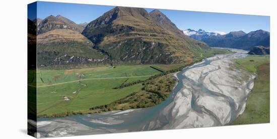 Elevated view of river passing through mountains, Matukituki River, Lake Waneka, Mount Aspiring...-null-Stretched Canvas