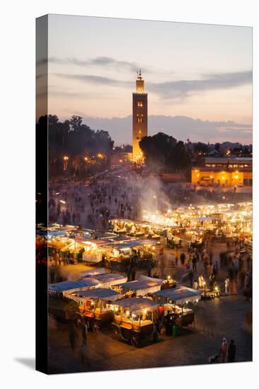 Elevated View of the Koutoubia Mosque at Dusk from Djemaa El-Fna-Gavin Hellier-Stretched Canvas