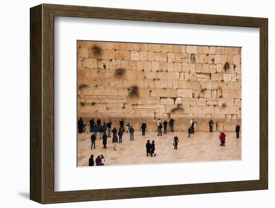 Elevated view of the Western Wall Plaza with people praying at the wailing wall, Jewish Quarter...-null-Framed Photographic Print