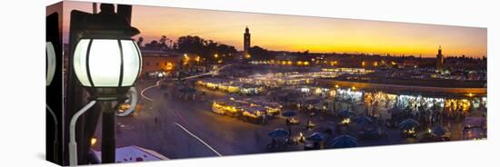 Elevated View over Djemaa El-Fna Square at Sunset, Marrakesh, Morocco-Doug Pearson-Stretched Canvas