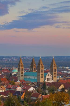 https://imgc.allpostersimages.com/img/posters/elevated-view-over-the-pecs-cathedral-at-sunset-pecs-hungary-europe_u-L-PNEZID0.jpg?artPerspective=n