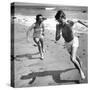 Elizabeth Liz Taylor and Roddy Mcdowall Playing on the Beach 1948-null-Stretched Canvas