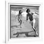 Elizabeth Liz Taylor and Roddy Mcdowall Playing on the Beach 1948-null-Framed Photo