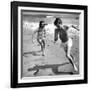 Elizabeth Liz Taylor and Roddy Mcdowall Playing on the Beach 1948-null-Framed Photo