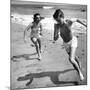 Elizabeth Liz Taylor and Roddy Mcdowall Playing on the Beach 1948-null-Mounted Photo