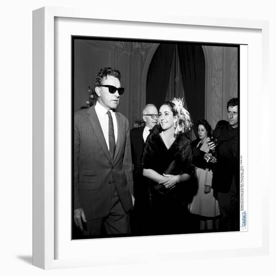 Elizabeth Taylor and Her Husband Richard Burton at a Party-Therese Begoin-Framed Photographic Print