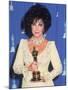 Elizabeth Taylor Holding Her Oscar in Press Room at Academy Awards-null-Mounted Premium Photographic Print