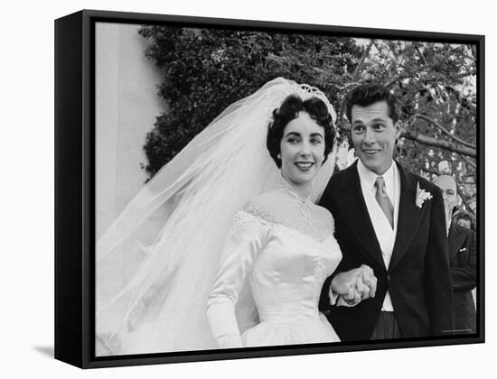 Elizabeth Taylor Wearing Beautiful Satin Wedding Gown with Husband Nicky Hilton Outside Church-Ed Clark-Framed Stretched Canvas