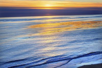 https://imgc.allpostersimages.com/img/posters/ellwood-mesa-coastline-pacific-ocean-orange-sunset-goleta-california_u-L-Q13C8JG0.jpg?artPerspective=n
