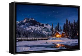 Emerald Lake Lodge in Banff, Canada during winter with snow and mountains at night with starry sky-David Chang-Framed Stretched Canvas