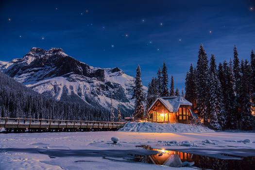 Emerald Lake Lodge in Banff, Canada during winter with snow and mountains  at night with starry sky' Photographic Print - David Chang | AllPosters.com
