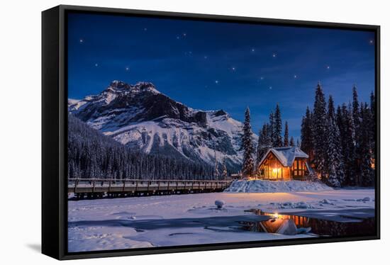 Emerald Lake Lodge in Banff, Canada during winter with snow and mountains at night with starry sky-David Chang-Framed Stretched Canvas