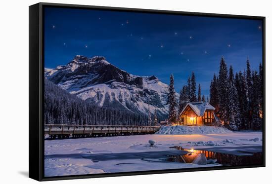 Emerald Lake Lodge in Banff, Canada during winter with snow and mountains at night with starry sky-David Chang-Framed Stretched Canvas