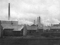 Smoke Billowing from Chimneys in Factory Town-Emil Otto Hopp?-Framed Photographic Print