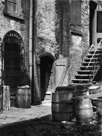 Barrels and Staircase in Alley on the Bowery, New York