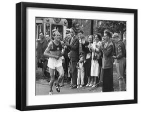 Emil Zatopek Leading in Marathon at 1952 Olympics-null-Framed Premium Photographic Print