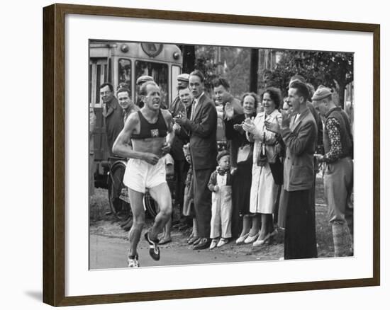 Emil Zatopek Leading in Marathon at 1952 Olympics-null-Framed Premium Photographic Print