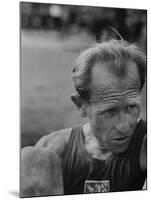 Emil Zatopek Sitting Tensely with Furrowed Brow after Winning Second of Three Olympic Races-Ralph Crane-Mounted Premium Photographic Print
